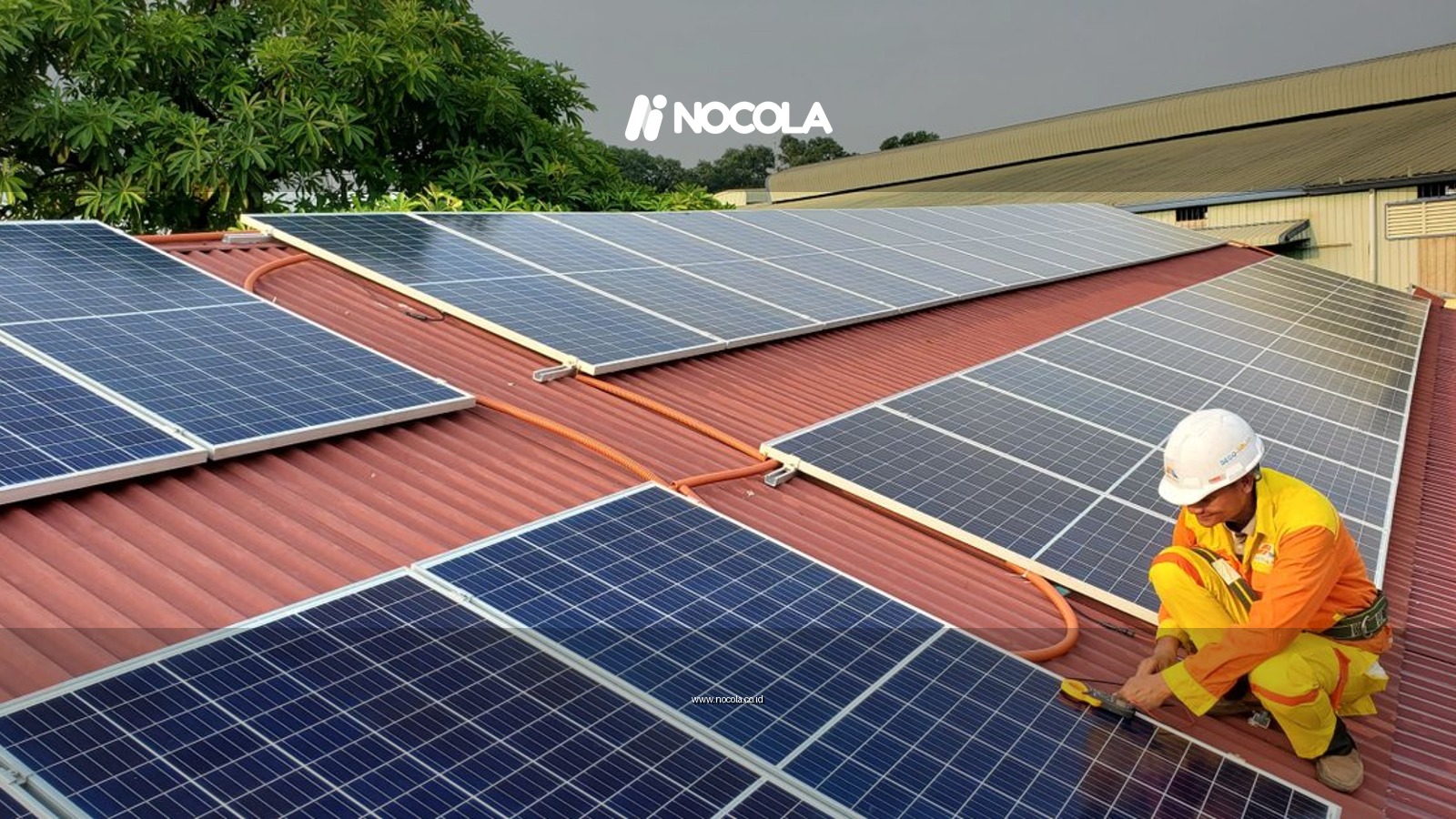 A solar technician performs maintenance on rooftop solar panels enhancing energy efficiency.